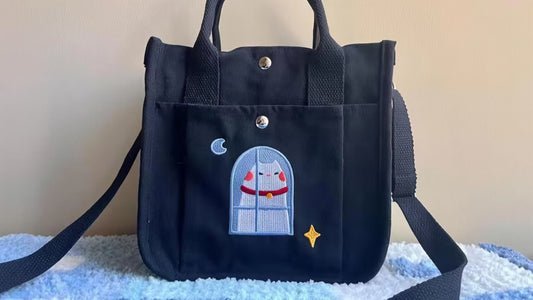 An originial wide strap boxy tote by Purpletimes Artist